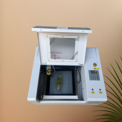 CNC Laser Cutting and Engraving Machine with CO2 Laser Tube for Textile Wood Acrylic